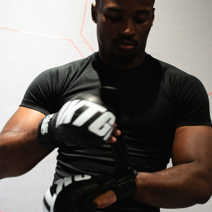 Sangle de poignet auto-agrippante des gants MMA OKTGN